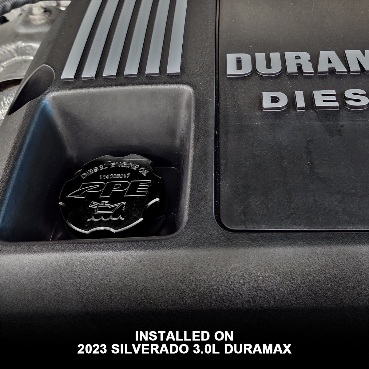 2017-2026 GM HD Billet Aluminum Engine Oil Filler Cap Black (114003027) installed on a 2023 Silverado 3.0L Duramax | Dirty Garage