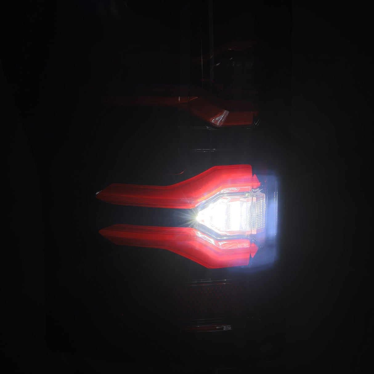 AlphaRex Luxx-Series LED tail lights in Black-Red for 2017-2022 Ford Super Duty, detail view