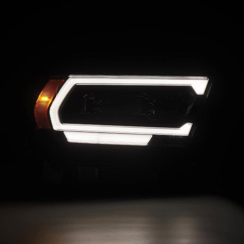 2019-2024 Ram 1500 Luxx-Series LED Projector Alpha Black Headlights - View 4 | Dirty Garage