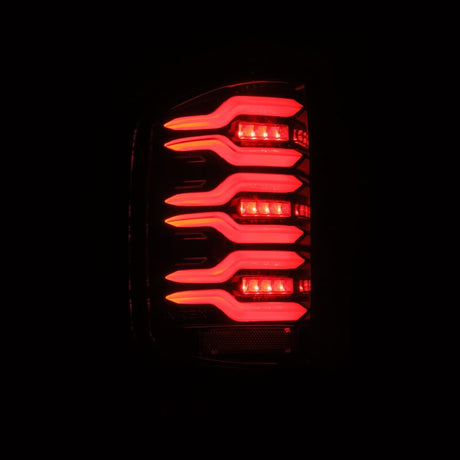2014-2018 GM 1500 HD Luxx-Series LED Tail Lights Alpha-Black w Active Light Sequential Signal - View 3 | Dirty Garage