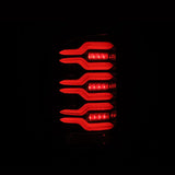 2014-2018 GM HD Luxx-Series LED Tail Lights Alpha Black Active Light Sequential Signal - View 3 | Dirty Garage