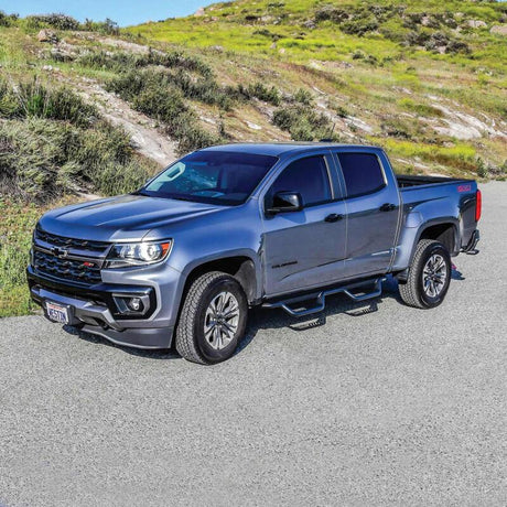 Westin 15-22 Chevrolet Colorado / GMC Canyon Crew Cab Outlaw Nerf Step Bars - Textured Black - View 4 | Dirty Garage