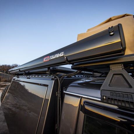 ARB Aluminum Awning, Black Frame, 8.2FT x 8.2FT, Installed with LED Light Strip - View 3 | Dirty Garage
