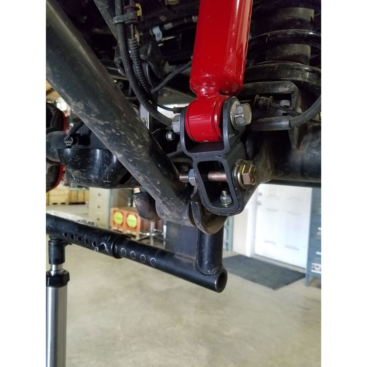JL Front and Rear Lower Shock Relocation Kit 18+ Wrangler JL/JLU - View 2 | Dirty Garage