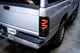 1994-2001 Ram 1500 HD Luxx-Series Black Red LED Tail Lights - View 3 | Dirty Garage