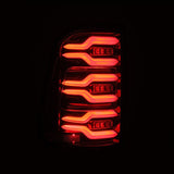 2019-2021 Ram 1500 Luxx-Series LED Tail Lights Alpha Black w Active Light Sequential Signal - View 6 | Dirty Garage