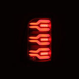 2019-2021 Ram 1500 Luxx-Series LED Tail Lights Black w Active Light Sequential Signal - View 5 | Dirty Garage