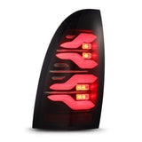 2005-2015 Tacoma Luxx-Series LED Tail Lights Black with Activation Light Sequential Signal - View 3 | Dirty Garage