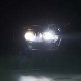 2019-2024 Ram 1500 Luxx-Series LED Projector Alpha Black Headlights - View 6 | Dirty Garage