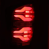 2016-2023 Tacoma Luxx-Series LED Tail Lights Black Red with Activation Light Sequential Signal - View 10 | Dirty Garage