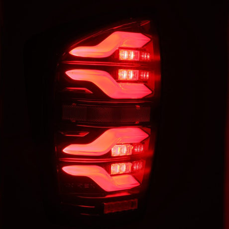 2016-2023 Tacoma Luxx-Series LED Tail Lights Black Red with Activation Light Sequential Signal - View 10 | Dirty Garage