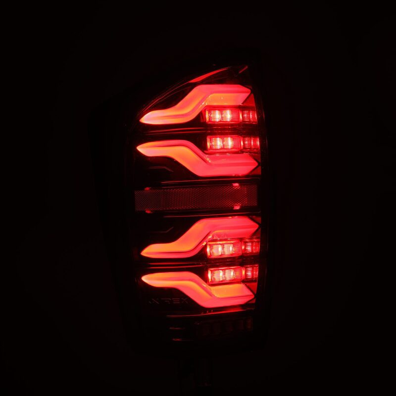 2016-2023 Tacoma Luxx-Series LED Tail Lights Alpha Black with Activation Light Sequential Signal - View 5 | Dirty Garage