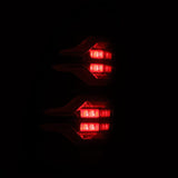 2005-2015 Tacoma Luxx-Series LED Tail Lights Alpha Black with Activation Light Sequential Signal - View 6 | Dirty Garage