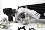 Garrett turbocharger on a white background with car parts.